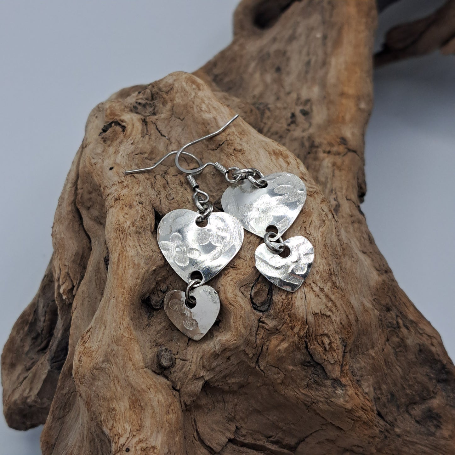 Handmade vintage silverware earrings made from silver-plated flattened spoon bowls