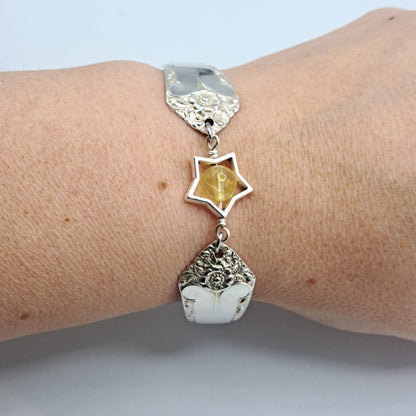 Handmade vintage silverware bracelet made from Starlight 1950 pattern silverplated handles with citrine gemstone center