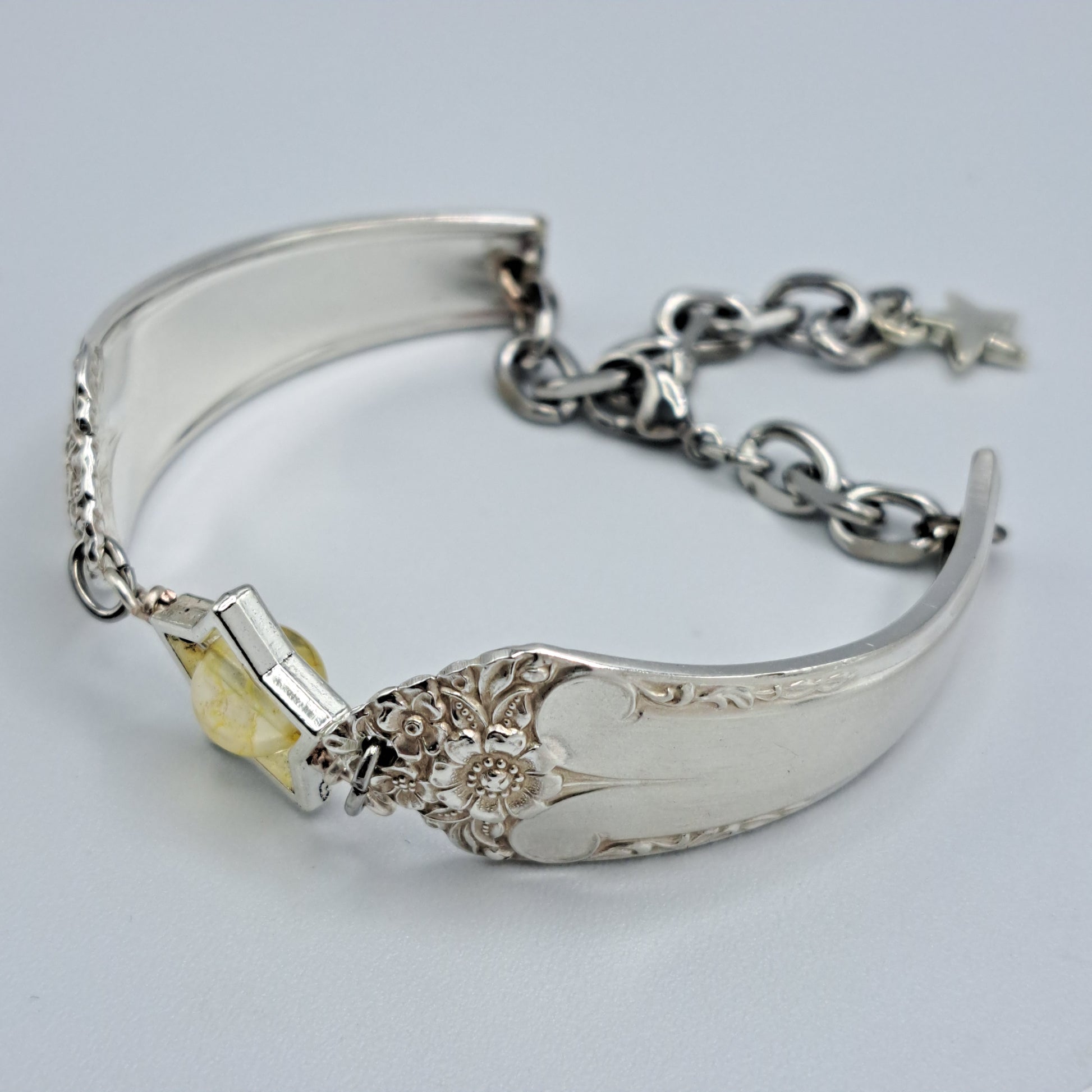 Handmade vintage silverware bracelet made from Starlight 1950 pattern silverplated handles with citrine gemstone center