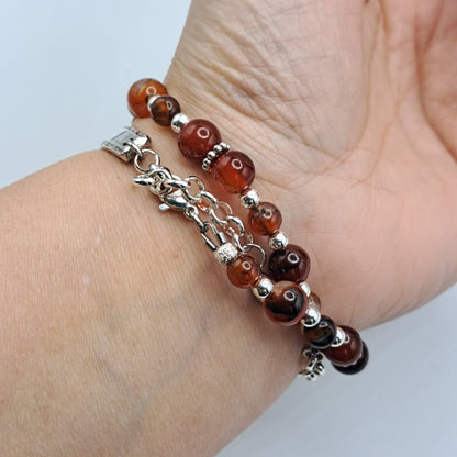 Handmade vintage silverware bracelet made from Adoration 1939 pattern silverplated handles with fire agate gemstone beads